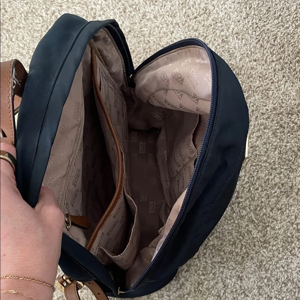 Elegant Michael Kors Navy and Tan Backpack